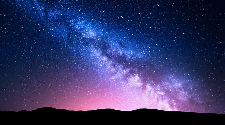 A view of the milky way at night, highlighting the opportunity for private luxury space travel.