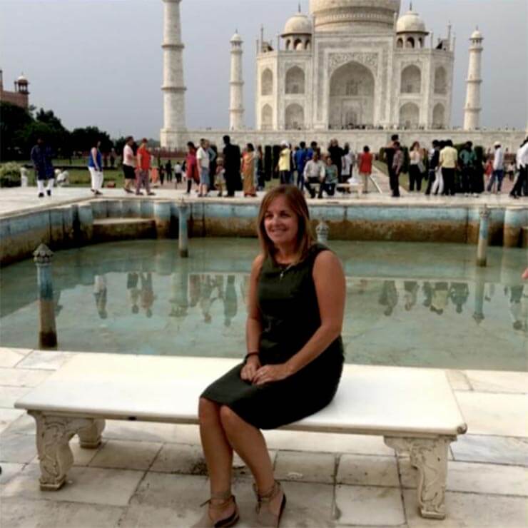 Sitting in front of the iconic taj mahal in India.